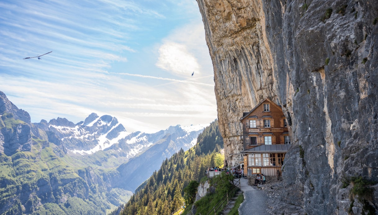 An inn is built on an overhanging rock